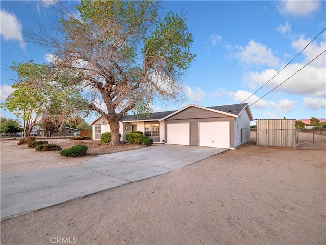 9383 11th Ave, Hesperia, CA 92345 - single story home featuring an attached garage, driveway, and a gate