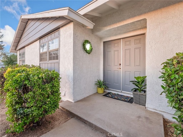 9383 11th Ave, Hesperia, CA 92345 - property entrance with stucco siding