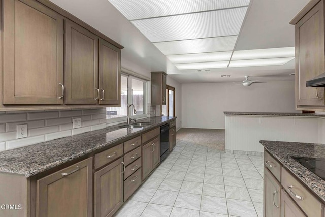 4713 Perris Way, Bakersfield, CA 93309 - kitchen featuring ceiling fan, dark stone counters, black appliances, and light carpet