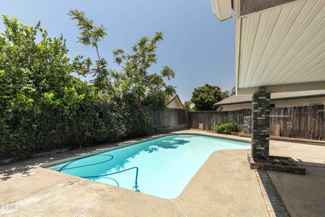 4713 Perris Way, Bakersfield, CA 93309 - view of swimming pool with a patio and a fenced backyard