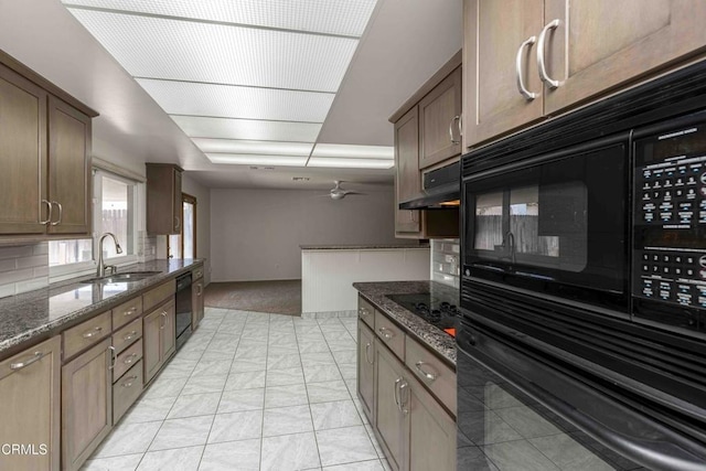 4713 Perris Way, Bakersfield, CA 93309 - kitchen featuring black appliances, dark stone countertops, light colored carpet, ceiling fan, and decorative backsplash