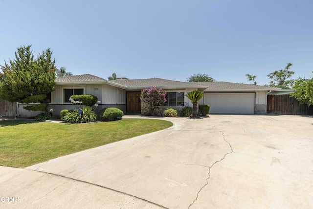 4713 Perris Way, Bakersfield, CA 93309 - single story home with an attached garage and driveway