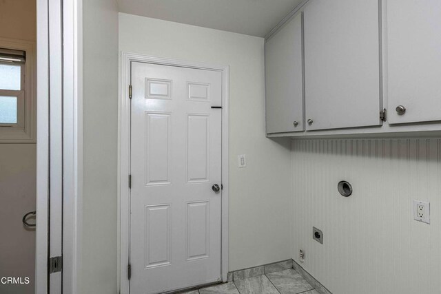 4713 Perris Way, Bakersfield, CA 93309 - laundry room with hookup for an electric dryer, cabinet space, and light marble finish floors