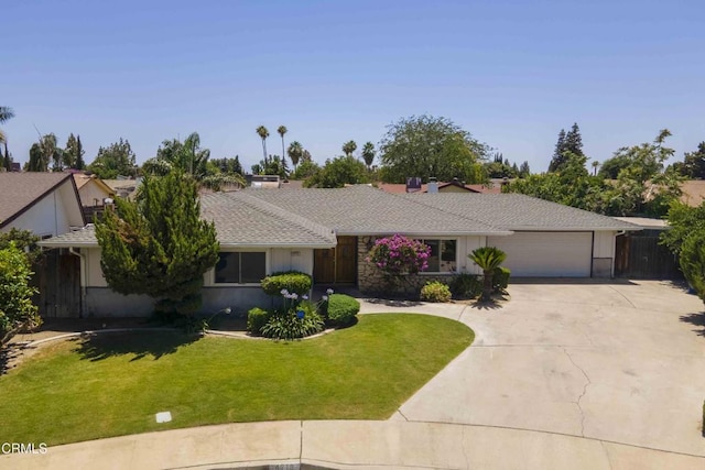 4713 Perris Way, Bakersfield, CA 93309 - single story home featuring an attached garage, driveway, and a front lawn