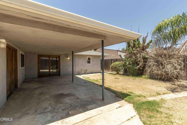 4713 Perris Way, Bakersfield, CA 93309 - view of patio featuring a carport