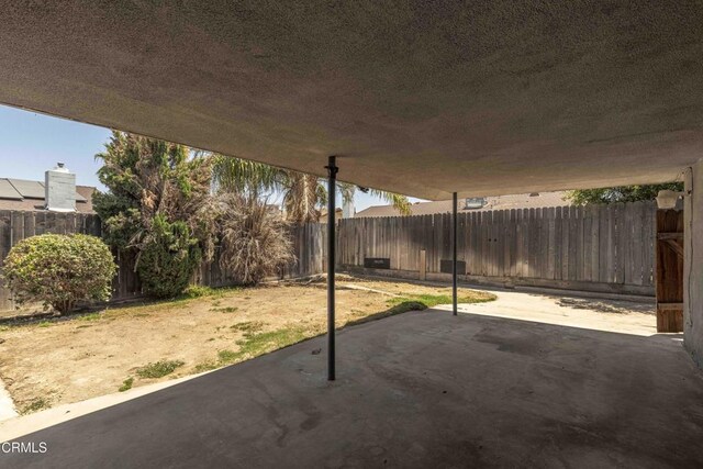 4713 Perris Way, Bakersfield, CA 93309 - fenced backyard with a patio area