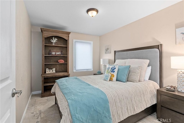 9229 Balboa Ave Unit 4, San Simeon, CA 93452 - bedroom with baseboards and stone tile flooring