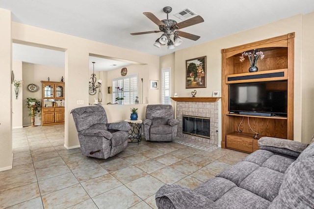 11337 Vista Elevada, San Diego, CA 92131 - living room with a ceiling fan, a tiled fireplace, and light tile patterned floors