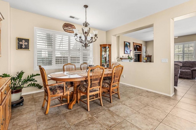 11337 Vista Elevada, San Diego, CA 92131 - dining space featuring a chandelier and baseboards