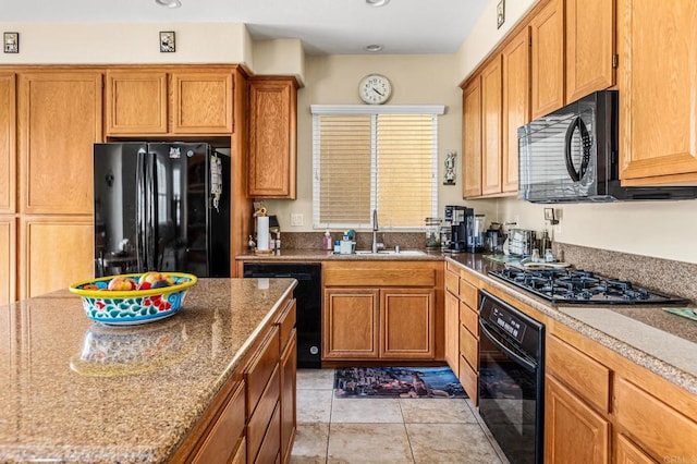 11337 Vista Elevada, San Diego, CA 92131 - kitchen with black appliances, brown cabinets, and stone countertops
