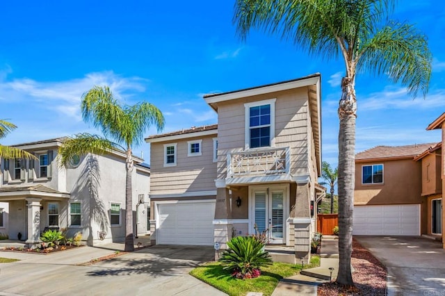 11337 Vista Elevada, San Diego, CA 92131 - multi unit property with a garage, driveway, a balcony, and stucco siding