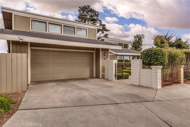 125 Park Pl, Pismo Beach, CA 93449 - view of front of property featuring a garage and driveway