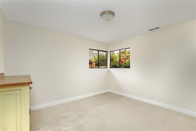 125 Park Pl, Pismo Beach, CA 93449 - spare room with baseboards and light colored carpet