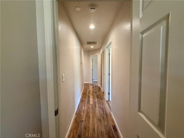 2048 10th St, Oroville, CA 95965 - corridor with wood finished floors and recessed lighting