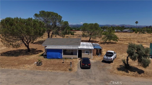 2048 10th St, Oroville, CA 95965 - view of front of home featuring dirt driveway and a mountain view