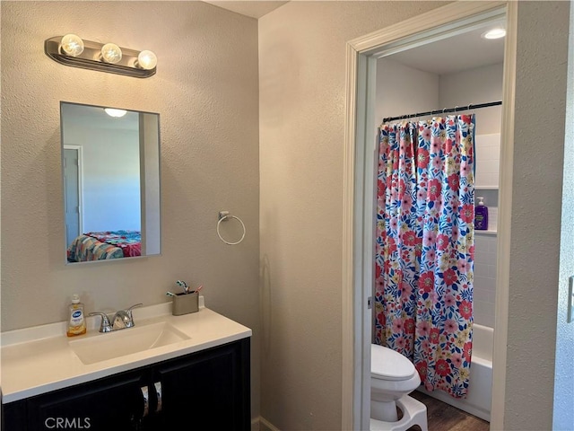 2048 10th St, Oroville, CA 95965 - full bathroom with vanity, shower / tub combo, and wood finished floors
