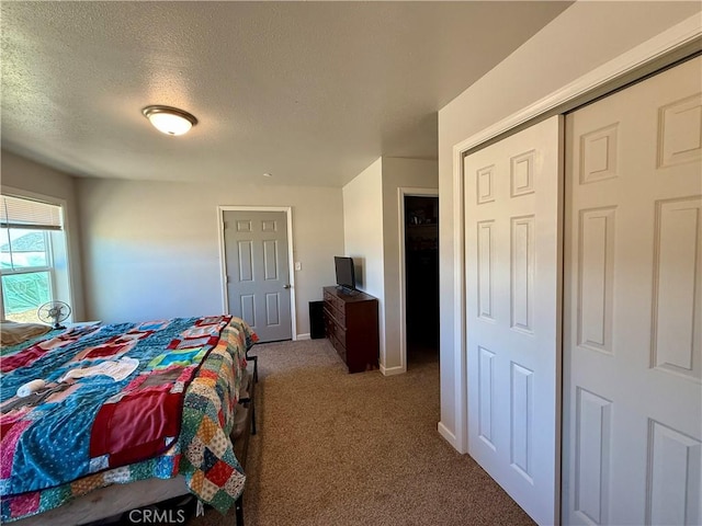 2048 10th St, Oroville, CA 95965 - carpeted bedroom with a textured ceiling and baseboards