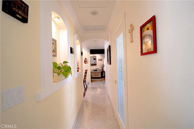 2509 Euclid E, Upland, CA 91784 - corridor with arched walkways, crown molding, and light tile patterned floors
