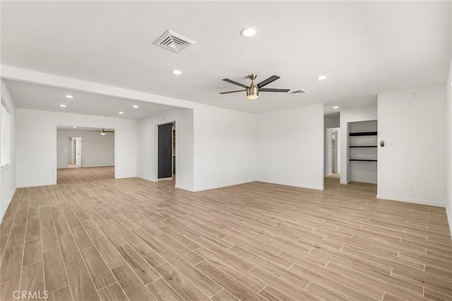7573 Cibola Trl, Yucca Valley, CA 92284 - unfurnished room featuring a ceiling fan, light wood-style flooring, and recessed lighting