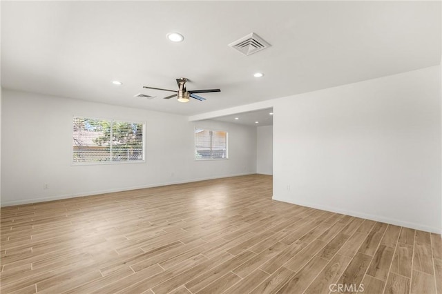 7573 Cibola Trl, Yucca Valley, CA 92284 - spare room featuring a ceiling fan, light wood-style flooring, and recessed lighting