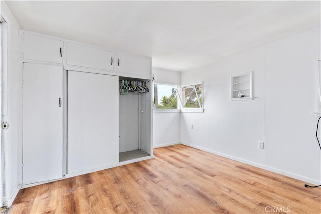 971 Ramona Ave, Los Osos, CA 93402 - unfurnished bedroom featuring light wood-type flooring and a closet