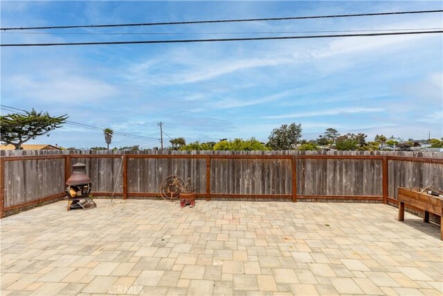 971 Ramona Ave, Los Osos, CA 93402 - fenced backyard featuring a patio area