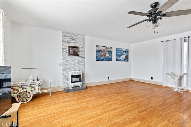 971 Ramona Ave, Los Osos, CA 93402 - unfurnished living room with heating unit, wood finished floors, and a ceiling fan