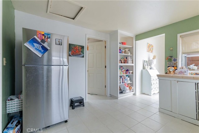 971 Ramona Ave, Los Osos, CA 93402 - kitchen featuring freestanding refrigerator, light tile patterned floors, and tile countertops