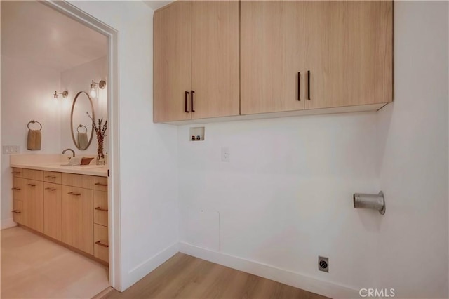 1810 N 2nd Ave, Upland, CA 91784 - washroom with hookup for an electric dryer, washer hookup, and light wood-style floors
