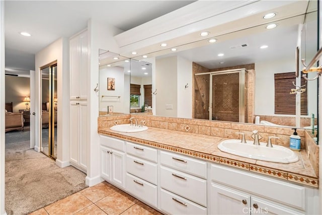 2575 Palomino Dr, Acton, CA 93510 - ensuite bathroom featuring a stall shower, double vanity, recessed lighting, and tile patterned floors