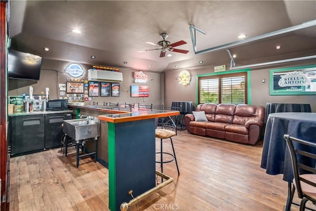2575 Palomino Dr, Acton, CA 93510 - community bar area featuring light wood finished floors, a ceiling fan, black microwave, recessed lighting, and lofted ceiling