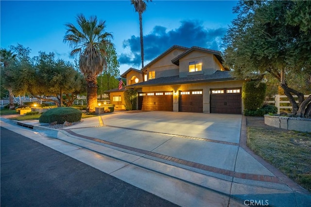 2575 Palomino Dr, Acton, CA 93510 - view of front of home with stucco siding, concrete driveway, and a garage