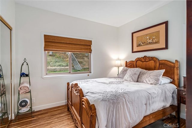 2575 Palomino Dr, Acton, CA 93510 - bedroom featuring wood finished floors and a closet
