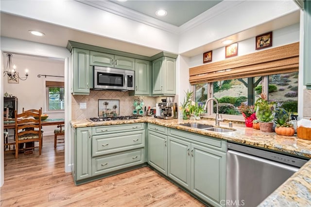 2575 Palomino Dr, Acton, CA 93510 - kitchen with stainless steel appliances, green cabinets, ornamental molding, tasteful backsplash, and recessed lighting