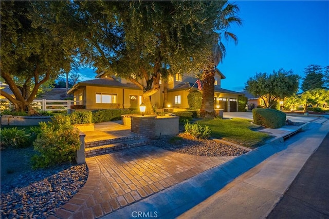 2575 Palomino Dr, Acton, CA 93510 - view of front of home featuring a garage and stucco siding
