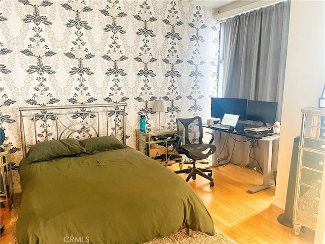 801 S Grand Ave Unit 1608, Los Angeles, CA 90017 - bedroom with wood finished floors and a desk