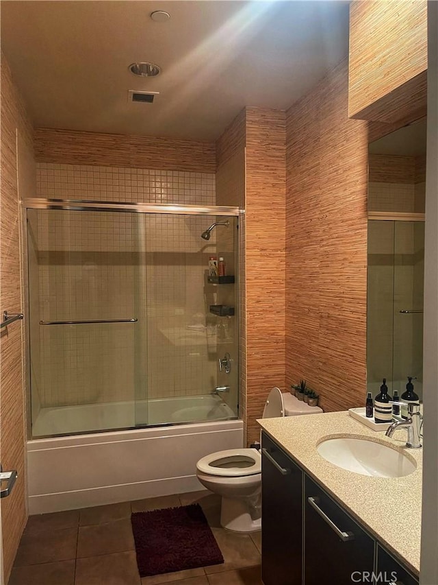 801 S Grand Ave Unit 1608, Los Angeles, CA 90017 - full bath featuring tile patterned floors, vanity, and bath / shower combo with glass door