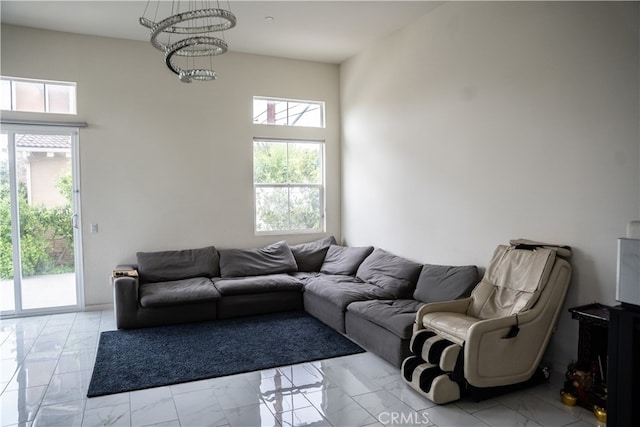 21125 Normandie Ave, Torrance, CA 90501 - living room featuring light marble finish flooring and a chandelier