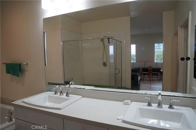 21125 Normandie Ave, Torrance, CA 90501 - full bathroom featuring a shower stall, double vanity, and a tub