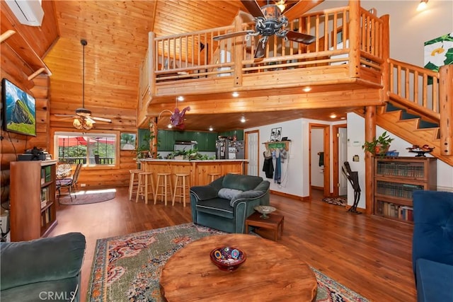 1415 Manzanita Way, Lake Arrowhead, CA 92352 - living room with a ceiling fan, high vaulted ceiling, wood finished floors, log walls, and stairway
