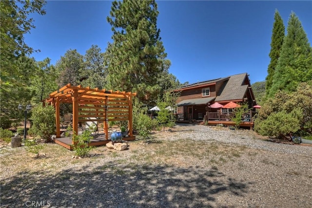 1415 Manzanita Way, Lake Arrowhead, CA 92352 - view of yard with a wooden deck and a pergola
