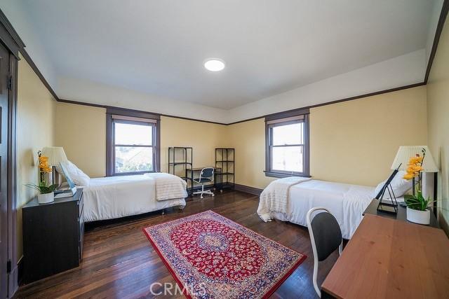 2109 Toberman St, Los Angeles, CA 90007 - bedroom with wood finished floors and baseboards