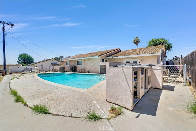 5622 Sharon Way, Jurupa Valley, CA 92509 - view of swimming pool with a patio and exterior kitchen