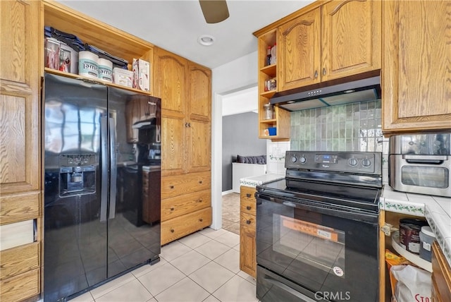 5622 Sharon Way, Jurupa Valley, CA 92509 - kitchen featuring black appliances, open shelves, under cabinet range hood, light tile patterned floors, and tasteful backsplash