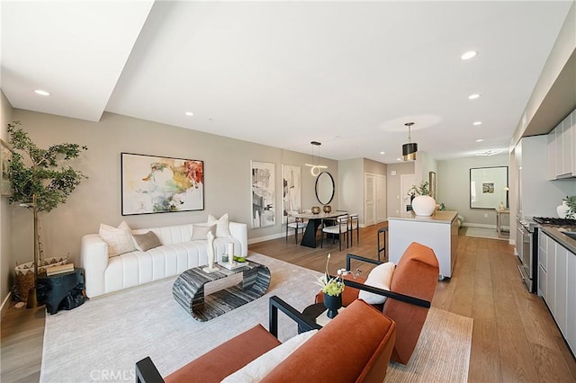 39 S Los Robles Ave Unit 6010, Pasadena, CA 91101 - living room featuring light wood-style floors and recessed lighting