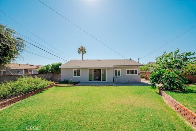 14314 De Alcala Dr, La Mirada, CA 90638 - back of property featuring a fenced backyard, a patio area, and stucco siding