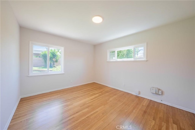 14314 De Alcala Dr, La Mirada, CA 90638 - empty room with light wood-type flooring and baseboards