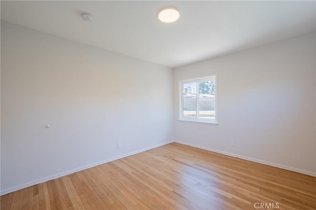 14314 De Alcala Dr, La Mirada, CA 90638 - spare room featuring light wood-style floors and a smoke detector