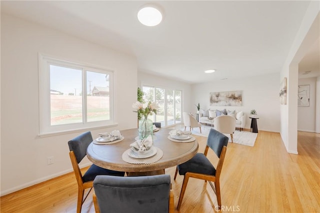 14314 De Alcala Dr, La Mirada, CA 90638 - dining room featuring light wood-style flooring and baseboards
