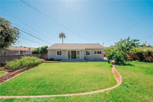 14314 De Alcala Dr, La Mirada, CA 90638 - rear view of house featuring a fenced backyard, a patio area, and stucco siding